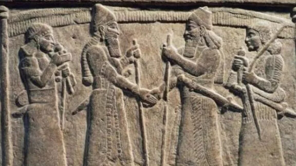 gestul de a stringe mina