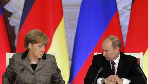 Putin si Merkel